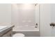 Bright bathroom showcasing a tiled tub with shower, modern fixtures and a neutral color palette at 2650 W Union Hills Dr # 123, Phoenix, AZ 85027