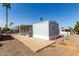 Manufactured home featuring covered parking and spacious patio area in a well-maintained community at 2650 W Union Hills Dr # 123, Phoenix, AZ 85027