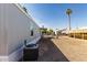 Side view of a well-kept manufactured home with low maintenance desert landscaping and a serene neighborhood setting at 2650 W Union Hills Dr # 123, Phoenix, AZ 85027