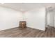 Spacious living room with modern wood flooring and neutral paint, creating a bright and inviting atmosphere at 2650 W Union Hills Dr # 123, Phoenix, AZ 85027