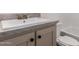 Bathroom vanity with a sink, stone countertop, and modern fixtures at 2650 W Union Hills Dr # 91, Phoenix, AZ 85027