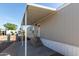 Welcoming covered entryway with modern siding and a well-maintained walkway at 2650 W Union Hills Dr # 91, Phoenix, AZ 85027