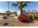 A view of the exterior elevation with palm trees and desert landscaping at 2650 W Union Hills Dr # 91, Phoenix, AZ 85027