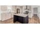 Well-lit kitchen features stainless steel appliances, light cabinetry, and a center island at 2650 W Union Hills Dr # 91, Phoenix, AZ 85027