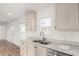 Bright kitchen features stainless steel sink, modern cabinets, and durable countertops at 2650 W Union Hills Dr # 91, Phoenix, AZ 85027