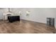 Open kitchen featuring new wood flooring, an island, modern appliances and ample space at 2650 W Union Hills Dr # 91, Phoenix, AZ 85027