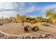 Desert backyard featuring gravel, cacti, and patio seating at 27171 N 73Rd St, Scottsdale, AZ 85266