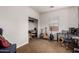 Bedroom with multiple guitars and a work space desk at 3438 E Betsy Ln, Gilbert, AZ 85296