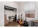 A bedroom with carpet and a window filled with musical instruments and closet at 3438 E Betsy Ln, Gilbert, AZ 85296