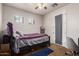 Bedroom with a full bed, neutral wall color, and lots of natural light at 3438 E Betsy Ln, Gilbert, AZ 85296