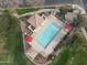 Bird's eye view of the community pool and lounging area, perfect for relaxing and enjoying the outdoors at 3438 E Betsy Ln, Gilbert, AZ 85296