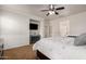 Spacious main bedroom features a ceiling fan, a TV, and neutral wall color at 3438 E Betsy Ln, Gilbert, AZ 85296