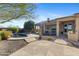Resort-style backyard featuring a freeform pool, spa, and covered patio at 41601 N River Bend Rd, Anthem, AZ 85086