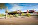Upscale clubhouse with desert landscaping and blue skies at 41601 N River Bend Rd, Anthem, AZ 85086