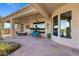 Covered patio featuring a hot tub and ample seating space at 41601 N River Bend Rd, Anthem, AZ 85086