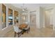 Elegant dining room with a large window and views of the outdoor living area at 41601 N River Bend Rd, Anthem, AZ 85086