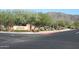 Inviting entrance to Anthem Golf & Country Club with lush landscaping and clear signage at 41601 N River Bend Rd, Anthem, AZ 85086