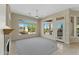 Bright living room with a large window and a view of the backyard landscaping at 41601 N River Bend Rd, Anthem, AZ 85086