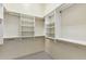 Spacious walk-in closet features built-in shelving and ample storage at 41601 N River Bend Rd, Anthem, AZ 85086