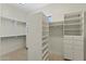 Well-organized walk-in closet with custom shelving and ample storage space at 41601 N River Bend Rd, Anthem, AZ 85086