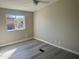 Neutral-toned bedroom features wood flooring and a window at 420 S 98Th Way, Mesa, AZ 85208