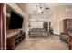 Large and airy living room featuring comfortable seating, tile floors, and stylish decor at 5607 E Enrose St, Mesa, AZ 85205