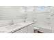 Bathroom featuring double sinks, solid surface counters and a walk-in shower at 5772 E Axle Ln, San Tan Valley, AZ 85140