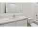 This bathroom boasts a large sink with a clean white design at 5772 E Axle Ln, San Tan Valley, AZ 85140
