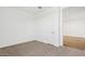 Bedroom with carpeted floors and a door at 5772 E Axle Ln, San Tan Valley, AZ 85140