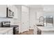 Bright kitchen with white cabinets, modern appliances and marble countertops at 5772 E Axle Ln, San Tan Valley, AZ 85140