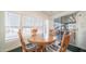 Bright dining room with a round table and chairs next to sliding doors leading to the outside patio at 60 S Jacknife Dr, Apache Junction, AZ 85119