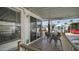 Inviting covered patio features a dining table, chairs and exterior view of the well-maintained property at 60 S Jacknife Dr, Apache Junction, AZ 85119