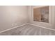 Bedroom with carpet, base-molding, window, and electrical outlets at 6460 S Springs Pl, Chandler, AZ 85249