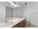 Bathroom with double vanity and a large mirror at 6707 N 42Nd Ave, Phoenix, AZ 85019