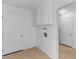 Bright laundry room with tile floors, a closet, and access to another room at 6707 N 42Nd Ave, Phoenix, AZ 85019
