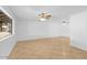 Spacious living room with tile flooring and ceiling fans at 6707 N 42Nd Ave, Phoenix, AZ 85019