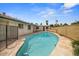 Refreshing in-ground pool with stone trim, privacy fencing and well-maintained landscaping at 6707 N 42Nd Ave, Phoenix, AZ 85019