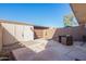 Private backyard featuring a storage shed and patio furniture for outdoor seating at 6713 S Jentilly Ln, Tempe, AZ 85283