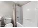 Clean bathroom featuring a shower and bathtub combination with a shower curtain at 6713 S Jentilly Ln, Tempe, AZ 85283
