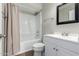 Updated bathroom with tub-shower, modern vanity and fixtures, and a stylish mirror at 6713 S Jentilly Ln, Tempe, AZ 85283