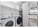 Convenient laundry room equipped with modern Samsung washer and dryer units at 6713 S Jentilly Ln, Tempe, AZ 85283