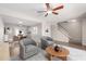Open concept living room with stylish chairs, hardwood floors, and contemporary décor at 6713 S Jentilly Ln, Tempe, AZ 85283