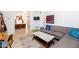 Modern living area with stylish furniture, a work space, and contemporary decor elements at 6729 E Sharon Dr, Scottsdale, AZ 85254