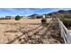 Large desert lot offering ample space and potential, complemented by mountain views at 7106 W Hombre Rd, San Tan Valley, AZ 85144