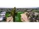 Aerial view of a lush golf course community featuring beautiful homes and manicured greens at 7700 E Gainey Ranch Rd # 127, Scottsdale, AZ 85258
