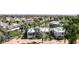 Expansive aerial view of neighborhood condos, highlighting mature trees and beautiful community at 7700 E Gainey Ranch Rd # 127, Scottsdale, AZ 85258