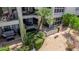 Birds eye view of backyard patio featuring seating and views of the green common area at 7700 E Gainey Ranch Rd # 127, Scottsdale, AZ 85258
