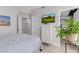 Comfortable bedroom with mounted TV, chest of drawers and easy access to closet space at 7700 E Gainey Ranch Rd # 127, Scottsdale, AZ 85258