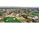 Picturesque aerial view of golf course with mature trees in a quiet residential neighborhood at 7700 E Gainey Ranch Rd # 127, Scottsdale, AZ 85258