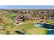 Picturesque aerial shot of a meticulously landscaped golf course with water features and lush greenery at 7700 E Gainey Ranch Rd # 127, Scottsdale, AZ 85258